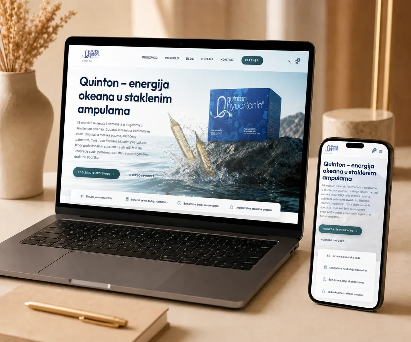 The quinton.rs website shown on a laptop and a phone - home page